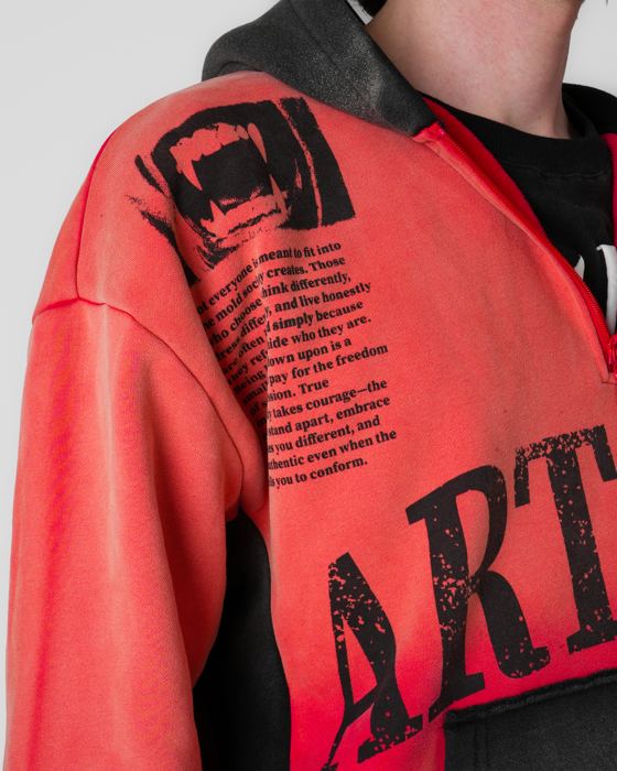 Text-block print on a crimson hoodie